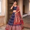 Glamorous Navy Blue Color Tussar Silk Dot And Ajarakh & Drawstring With Foil Printed & Heavy Tassels Lehenga Choli