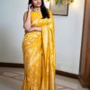 Mesmerizing Yellow Color Soft Lichi Silk Ordinary Design Saree