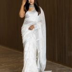Aglow White Color Soft Lichi Silk Ordinary Design Rich Pallu Saree
