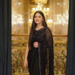 Graceful Black Color Georgette Sequins Lace border on Saree