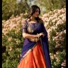 Peaceful Orange Color Kanchipuram Zari Weaving Lehenga Choli