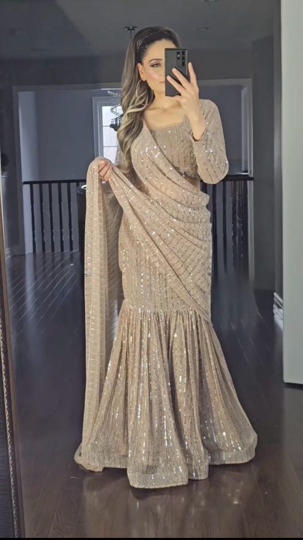 Grand Cream Color fancy Lecrae Drop style Lehenga Choli