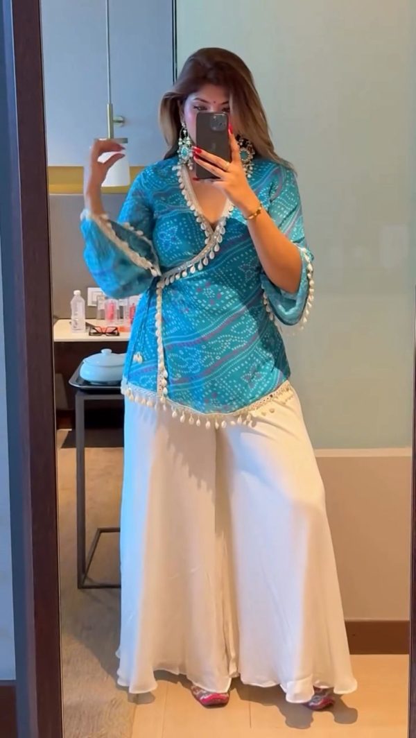 Sky Blue Georgette Cowrie Lace Work Salwar Suit