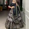 Dazzling Black Color Tussar Silk Leheriya Foil Print Lehenga Choli