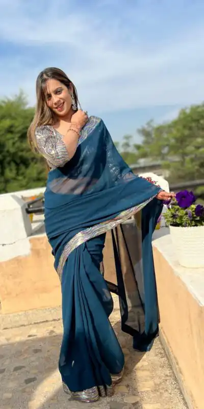 JR 579 Peacock Blue Color Georgette Sequence Work Lace Saree Casual, Wedding, Festive, Events . Expected Delivery  4-6 Working Days @1599/- only                                                                                                                                             | Sarees, Bollywood Sarees, Creative Sarees, Designer Sarees, Embroidered Sarees, Ethnic Saree, Modern Digital sarees, Party Wear Sarees