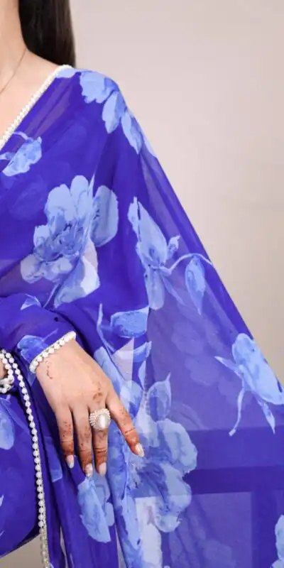 YNF 7011 Blue Color Chiffon Foral Printed Pearl Lace Border Saree Casual, Wedding, Festive, Events . Expected Delivery  4-6 Working Days @1499/- only                                                                                | Sarees, Bollywood Sarees, Creative Sarees, Designer Sarees, Embroidered Sarees, Ethnic Saree, Modern Digital sarees, Party Wear Sarees