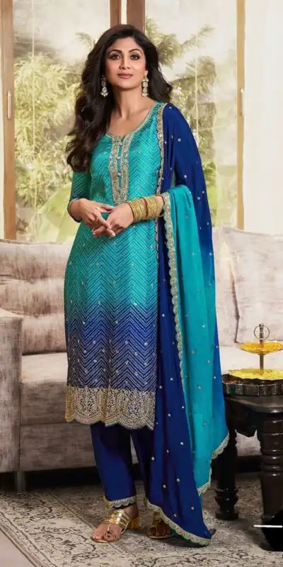 MF 1004 Navy Blue Chinoon Silk Salwar Suit with Embroidery Work. Available at ₹1749 only. Delivery 4-6 Working Days. Shop now. | Jump Suits, Tops & Bottoms, Track Suits, Trendy Wear, Salwar suit, Designer Suits, Casual Suits, Creative suits, Palazzo Suits, Party Wear Suits, Patiala Suits, Straight Suits