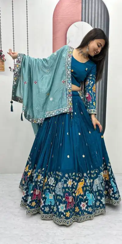 PC 545 Peacock Blue Vichitra Silk Lehenga Choli with Lace Border & Lace Work. Special Price ₹3249. Delivery 4-6 Working Days. Shop now. | Lehenga, Bollywood Lehenga, Creative Lehenga, Designer Lehenga, Embroidered Lehenga, Party Wear Lehenga