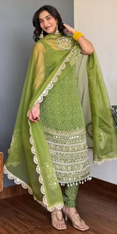 ST 1142 Green Faux Georgette Salwar Suit with Mirror Work & Embroidery Work. Introductory Price ₹2449. Delivery 4-6 Working Days. Shop now. | Jump Suits, Salwar suit, Designer Suits, Casual Suits, Creative suits, Palazzo Suits, Party Wear Suits, Patiala Suits, Straight Suits