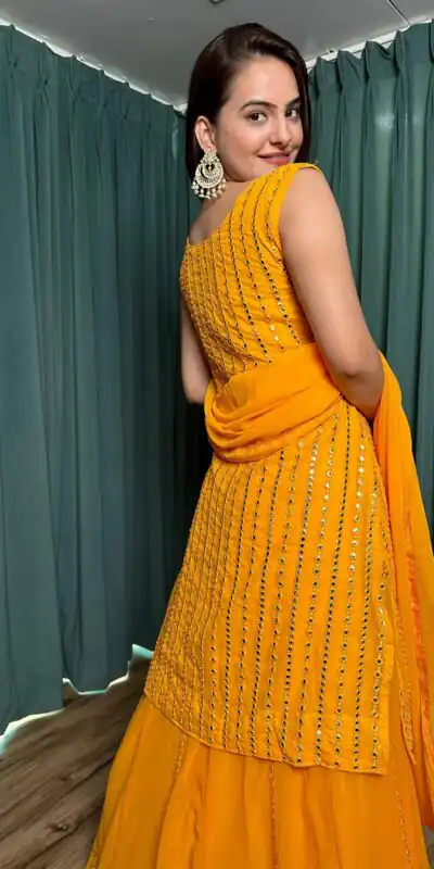 FB L299 Yellow in Color Georgette Mirror Work Lehenga Choli e. Introductory Price ₹2549. Delivery 4-6 Working Days. Shop now. | Lehenga, Bollywood Lehenga, Creative Lehenga, Designer Lehenga, Embroidered Lehenga, Party Wear Lehenga