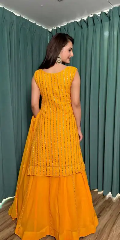 FB L299 Yellow in Color Georgette Mirror Work Lehenga Choli e. Introductory Price ₹2549. Delivery 4-6 Working Days. Shop now. | Lehenga, Bollywood Lehenga, Creative Lehenga, Designer Lehenga, Embroidered Lehenga, Party Wear Lehenga