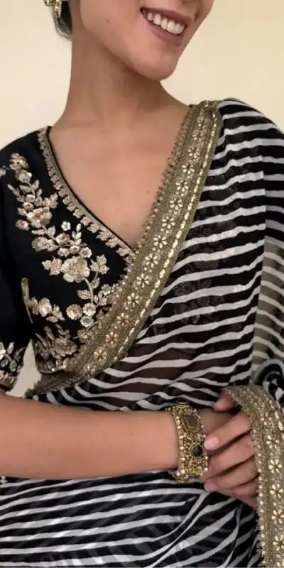 NC 5553 Black Faux Georgette Saree Perfect for Wedding, Party, Bridal Wear, Baisakhi, Raksha Bandhan –. Introductory Price ₹1899. Delivery 4-6 Workin | Sarees, Bollywood Sarees, Creative Sarees, Designer Sarees, Embroidered Sarees, Ethnic Saree, Modern Digital sarees, Party Wear Sarees