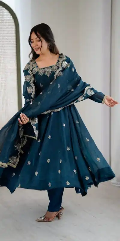 ZF 5011 Teal Crunchy Silk Gown with Embroidery Work. Wedding, Party, Festive, Events Best Price ₹2099. Delivery 4-6 Working Days. Shop now. | Gowns, Bollywood Gowns, Creative Gowns, Designer Gowns, Embroidered Gowns, Party Wear Gowns