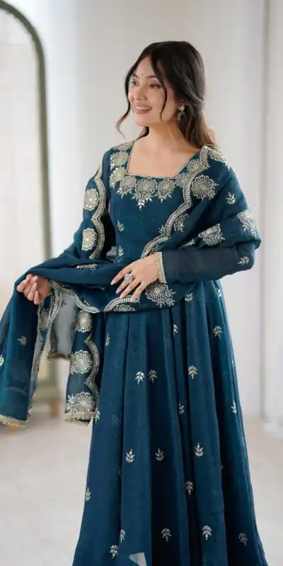 ZF 5011 Teal Crunchy Silk Gown with Embroidery Work. Wedding, Party, Festive, Events Best Price ₹2099. Delivery 4-6 Working Days. Shop now. | Gowns, Bollywood Gowns, Creative Gowns, Designer Gowns, Embroidered Gowns, Party Wear Gowns