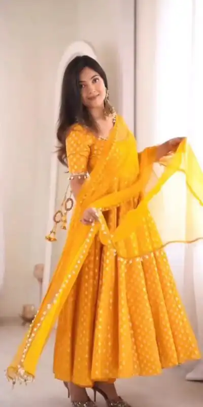 SRK 5347 Yellow Chanderi Jacquard Butti Salwar Suit with Mirror Work & Lace Work. Festive Deal ₹2149. Delivery 4-6 Working Days. Shop now. | Anarkali Suits, Bollywood Anarkali, Creative-Anarkali, Designer Anarkali, Embroidered Anarkali, Party Wear Anarkali