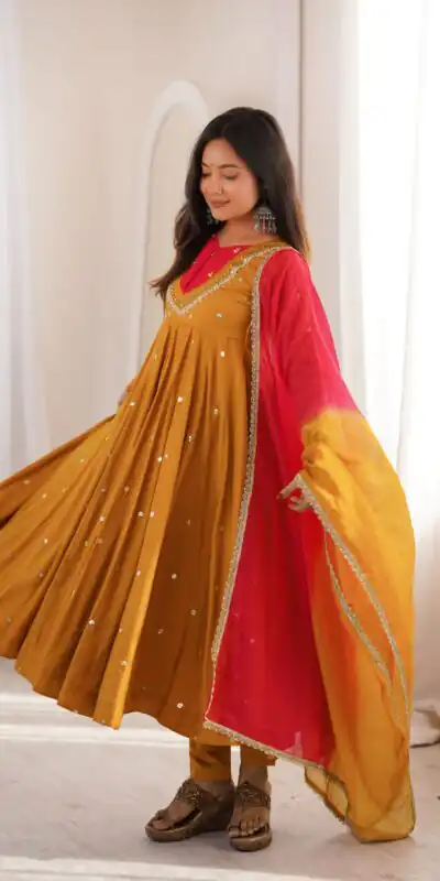 ZF 5023 Mustered Roman Silk Gown with Mirror Work & Embroidery Work. Special Price ₹2099. Delivery 4-6 Working Days. Shop now. | Gowns, Bollywood Gowns, Creative Gowns, Designer Gowns, Embroidered Gowns, Party Wear Gowns