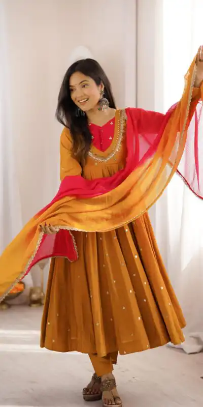 ZF 5023 Mustered Roman Silk Gown with Mirror Work & Embroidery Work. Special Price ₹2099. Delivery 4-6 Working Days. Shop now. | Gowns, Bollywood Gowns, Creative Gowns, Designer Gowns, Embroidered Gowns, Party Wear Gowns