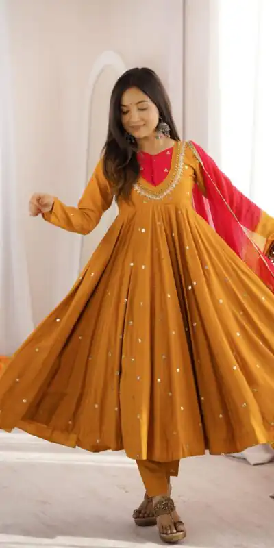 ZF 5023 Mustered Roman Silk Gown with Mirror Work & Embroidery Work. Special Price ₹2099. Delivery 4-6 Working Days. Shop now. | Gowns, Bollywood Gowns, Creative Gowns, Designer Gowns, Embroidered Gowns, Party Wear Gowns