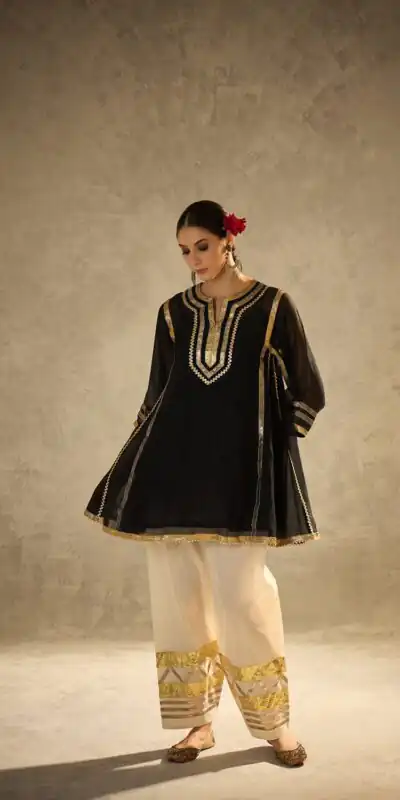 ST 1169 Black Black Chinon Salwar Suit with Gotta Patti Work. Available at ₹1849 only. Delivery 4-6 Working Days. Shop now. | Jump Suits, Salwar suit, Designer Suits, Casual Suits, Creative suits, Palazzo Suits, Party Wear Suits, Patiala Suits, Straight Suits
