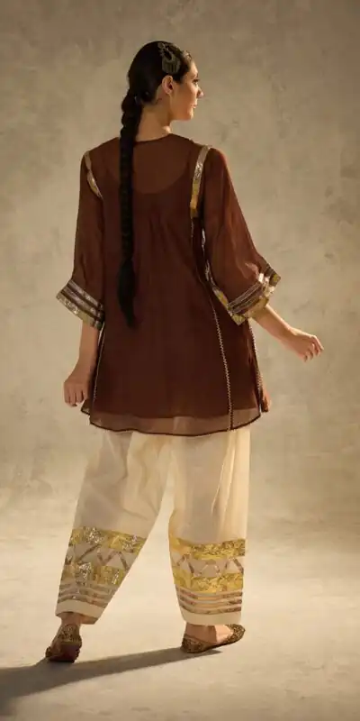 ST 1169 Rust Color Chinon Salwar Suit with Gotta Patti Work. Available at ₹1849 only. Delivery 4-6 Working Days. Shop now. | Jump Suits, Salwar suit, Designer Suits, Casual Suits, Creative suits, Palazzo Suits, Party Wear Suits, Patiala Suits, Straight Suits