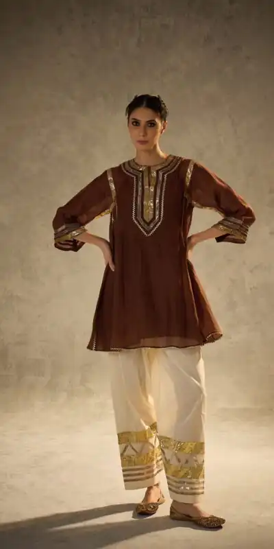 ST 1169 Rust Color Chinon Salwar Suit with Gotta Patti Work. Available at ₹1849 only. Delivery 4-6 Working Days. Shop now. | Jump Suits, Salwar suit, Designer Suits, Casual Suits, Creative suits, Palazzo Suits, Party Wear Suits, Patiala Suits, Straight Suits