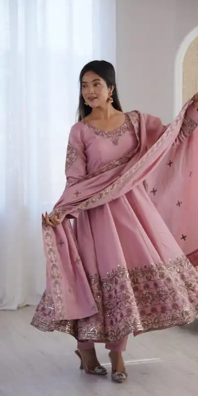 ZF 5016 Dusty Pink Roman Silk Gown with Embroidery Work. Wedding, Party, Festive, Events, Navratri, Offer ₹2499. Delivery 4-6 Working Days. Shop now. | Gowns, Bollywood Gowns, Creative Gowns, Designer Gowns, Embroidered Gowns, Party Wear Gowns
