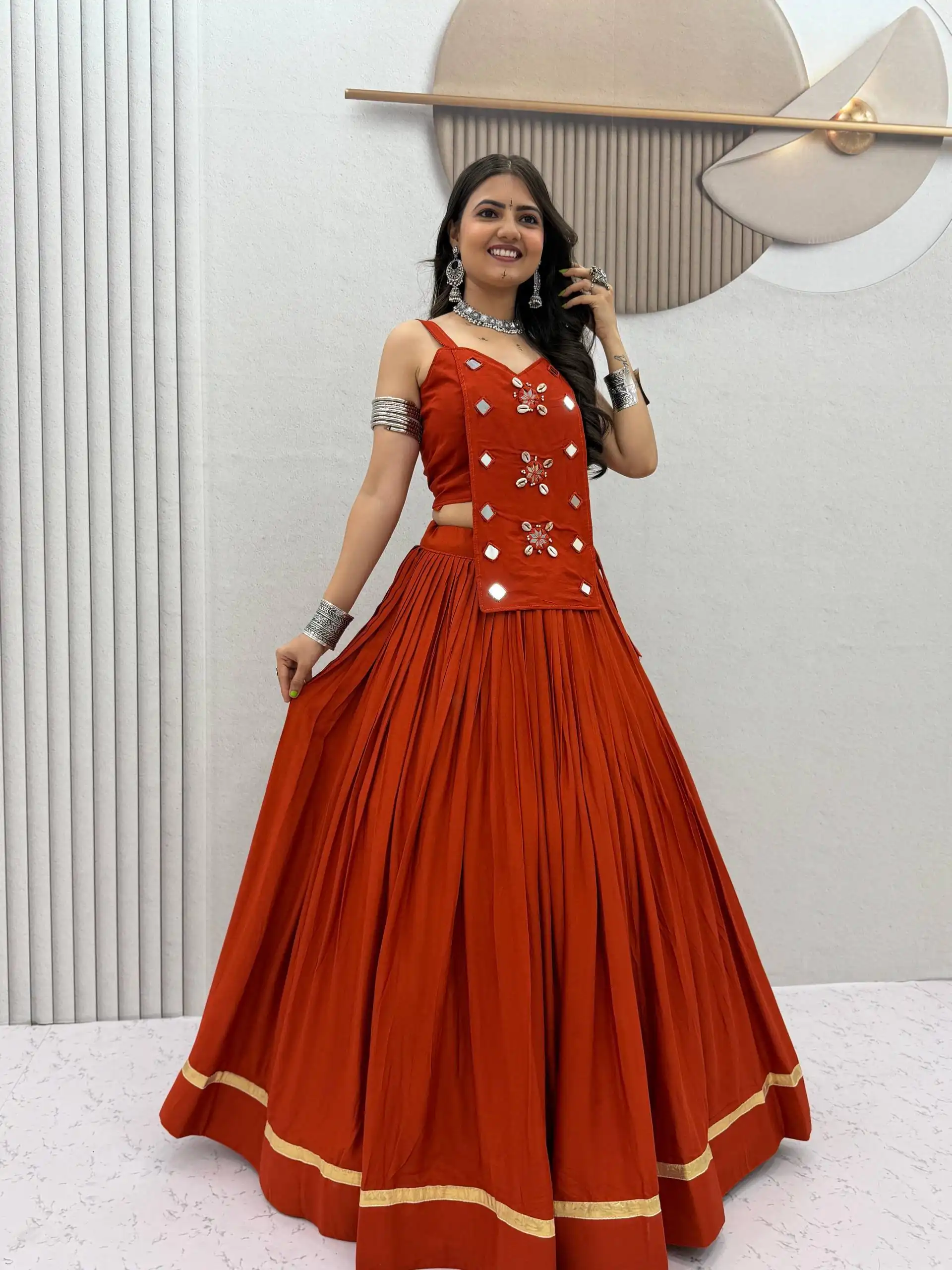 PC 581 Rust Color Pure Cotton Lehenga Choli with Cowrie Work. Festive Deal ₹2999. Delivery 4-6 Working Days. Online Shop now. | Lehenga, Bollywood Lehenga, Creative Lehenga, Designer Lehenga, Embroidered Lehenga, Party Wear Lehenga