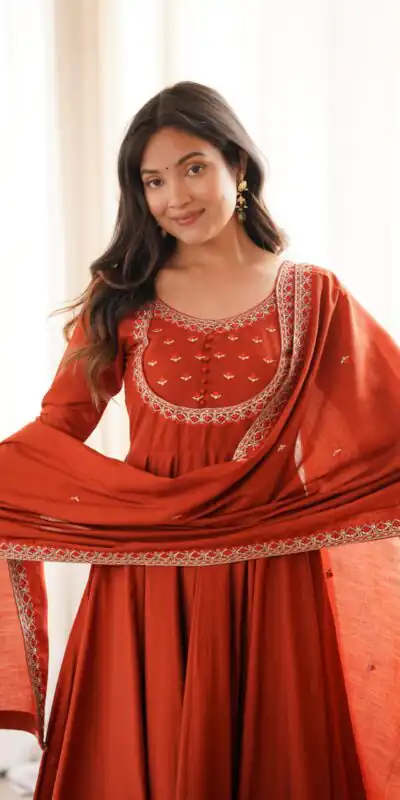KB 312 Rust Roman Silk Chanderi Anarkali Suit with Thread Embroidery & Embroidery Work. Special Price ₹2299. Delivery 4-6 Working Days. Shop now. | Anarkali Suits, Bollywood Anarkali, Creative-Anarkali, Designer Anarkali, Embroidered Anarkali, Party Wear Anarkali