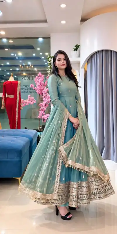 SSR 553 Teal Fendy Silk Gown with Sequins Work & Thread Embroidery. Now at just ₹2399. Delivery 4-6 Working Days. Shop now. | Gowns, Bollywood Gowns, Creative Gowns, Designer Gowns, Embroidered Gowns, Party Wear Gowns