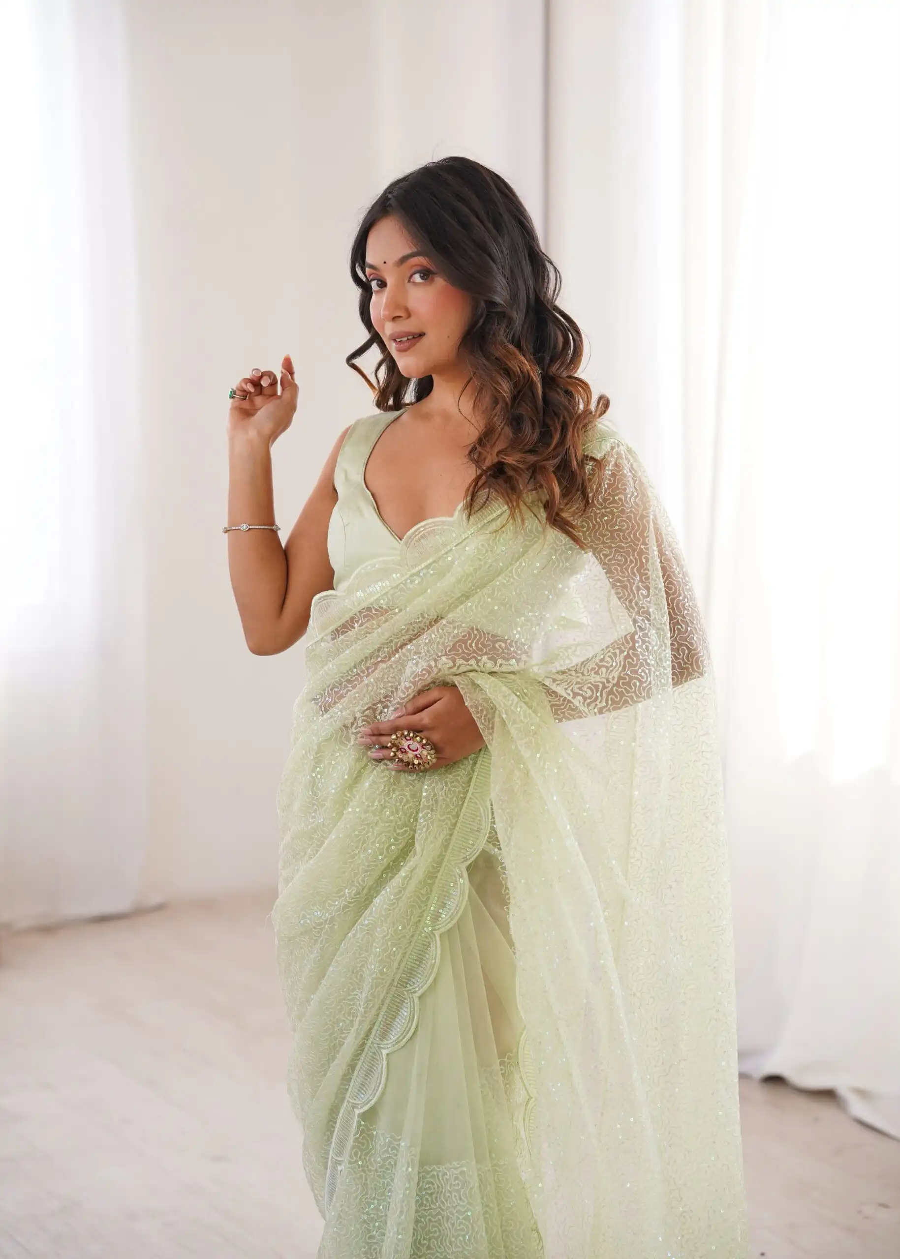 Shiny Pista Soft Net Sequins Work Saree - Image 4
