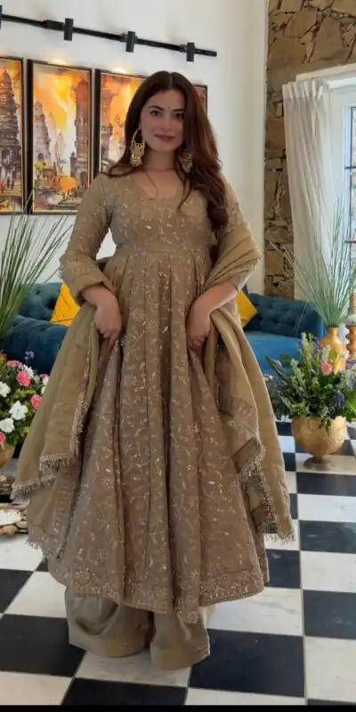 SR 1726 Chiku Fendy Silk Gown with Embroidery Work & Sequins Work. Special Price ₹2899. Delivery 4-6 Working Days. Shop now. | Gowns, Bollywood Gowns, Creative Gowns, Designer Gowns, Embroidered Gowns, Party Wear Gowns